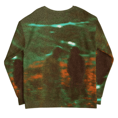 Sweater with a reflective pattern on a green background