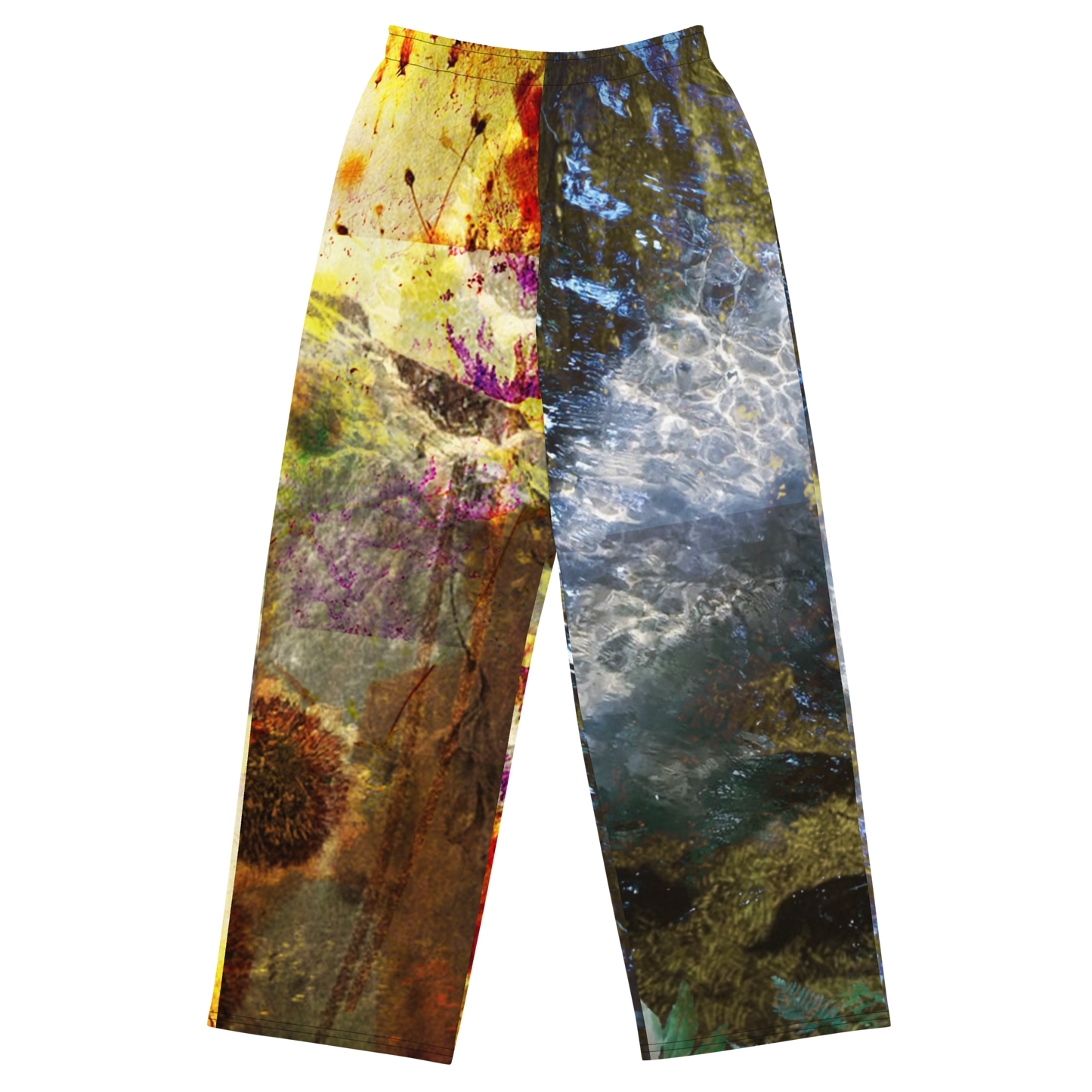 A pair of wide-leg pants featuring a split abstract design: one leg has a yellow, brown, and purple paint-splatter pattern, while the other leg has a blue, gray, and white water-like pattern, shown against a plain white background.