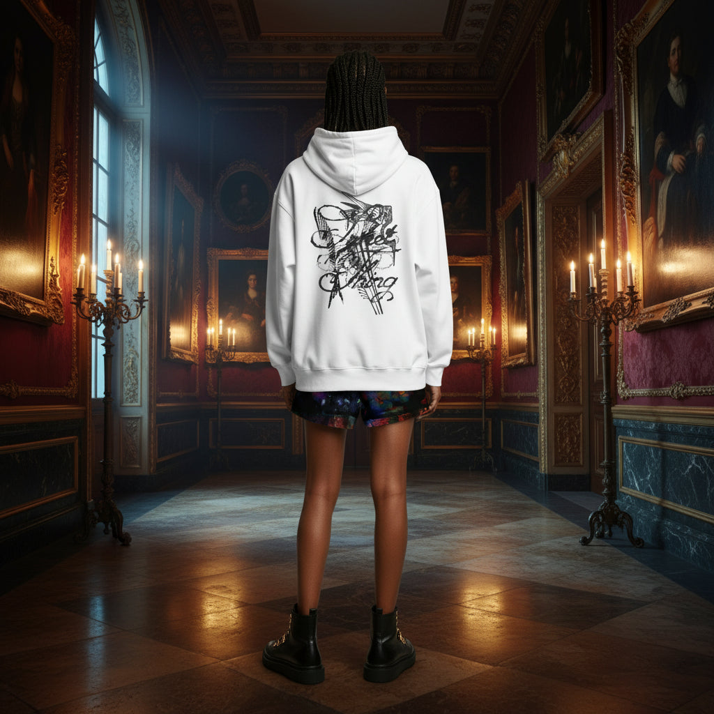 A person standing in a grand, candle-lit historical room, viewed from behind, wearing a white hoodie with a black graphic print on the back, a short dark skirt, and black boots.