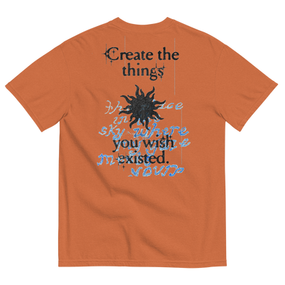 Orange t-shirt with text and sun graphic on the back, on a white background