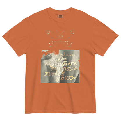 Orange t-shirt with butterfly design and text on a white background