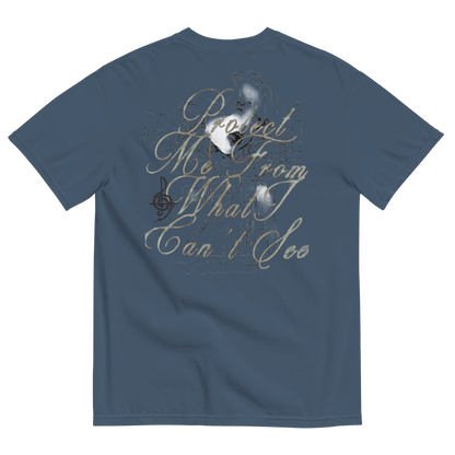 A blue-gray short-sleeve t-shirt shown from the back, featuring a graphic print with the phrase 'Protect Me From What I Can't See' in a metallic gold script font, overlaid with a white and black distressed circular emblem.