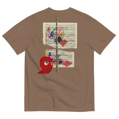 Brown t-shirt with a red face design and sheet music on the back