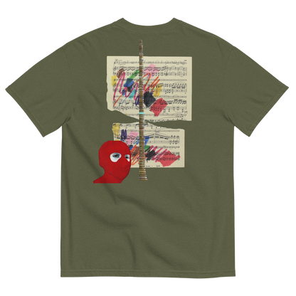 Green t-shirt with a red abstract design and sheet music on a white background