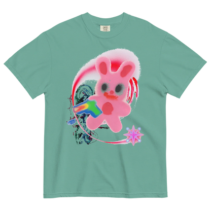 Green t-shirt with a colorful graphic of a pink bunny & abstract details.