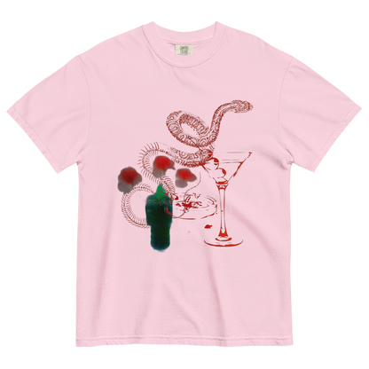 A light pink short-sleeve crewneck t-shirt featuring a graphic print of a snake, a martini glass, and a green bottle with red splatters on the front.